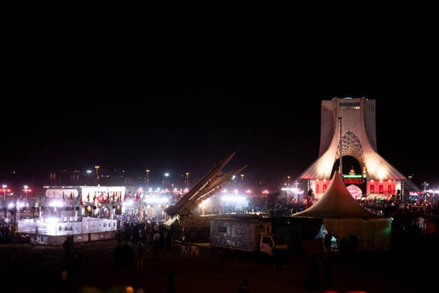 Iranian Zulfiqar road-mobile, ballistic missiles are displayed during a pro-government demonstration in Tehran, Iran, on Friday, July 24, 2026. U.S. and Iran traded attacks for the 13th night in a row with few signs of either side returning to negociations.  IRN2026072402 BehnamxTofighi