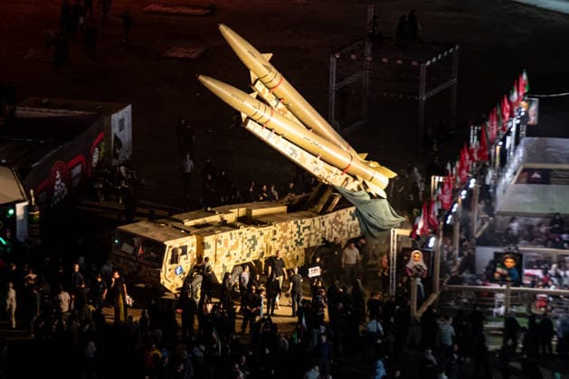 Iranian Zulfiqar road-mobile, ballistic missiles are displayed during a pro-government demonstration in Tehran, Iran, on Friday, July 24, 2026. U.S. and Iran traded attacks for the 13th night in a row with few signs of either side returning to negociations.  IRN2026072403 BehnamxTofighi
