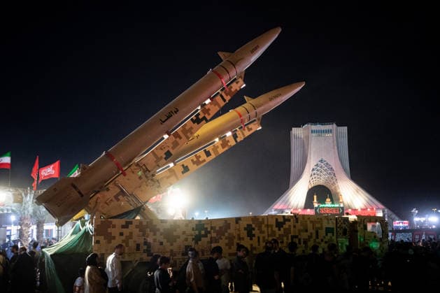 Iranian Zulfiqar road-mobile, ballistic missiles are displayed during a pro-government demonstration in Tehran, Iran, on Friday, July 24, 2026. U.S. and Iran traded attacks for the 13th night in a row with few signs of either side returning to negociations.  IRN2026072407 BehnamxTofighi