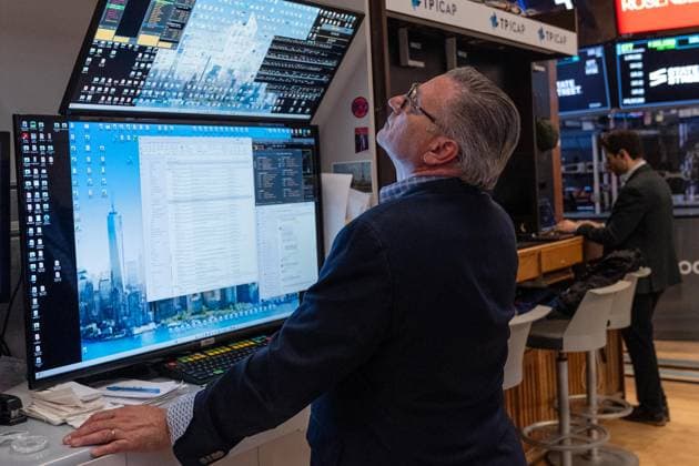 July 24, 2026, New York, New York, USA: A trader works on the floor of the New York Stock Exchange (NYSE) in New York, NY on July 24, 2026. New York USA  - ZUMAr339 20260724_znp_r339_007 Copyright: xLevxRadinx