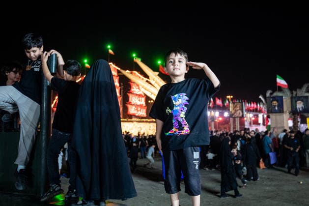A youthful protestor attends a pro-government demonstration in Tehran, Iran, on Friday, July 24, 2026. U.S. and Iran traded attacks for the 13th night in a row with few signs of either side returning to negotiations.  IRN2026072428 BehnamxTofighi