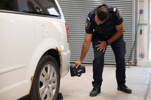 July 24, 2026, Windsor, On, CANADA: A Canada Border Services agent uses a handheld X-ray machine, called a Backscatter, during a tour of the inspection facilities at the Gordie Howe International Bridge, in Windsor, Ont., Friday, July 24, 2026. Windsor CANADA  - ZUMAc35_ 20260724_zaf_c35_122 Copyright: xDaxxMelmerx