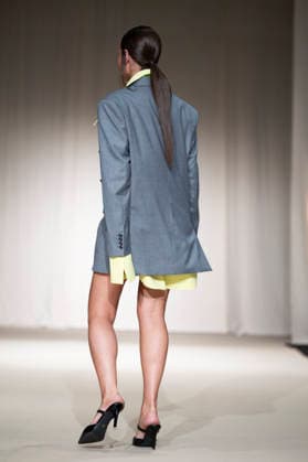 ROMANIAN DESIGNERS - MOMAD Fashion Week de Madrid ,Spain - 24 Jul 2026 A model walks the runway wearing a design by Romanian designers during Momad Fashion Week de Madrid in IFEMA Madrid Spain Copyright: xAtilanoxGarciax xSOPAxImagesx photo03113