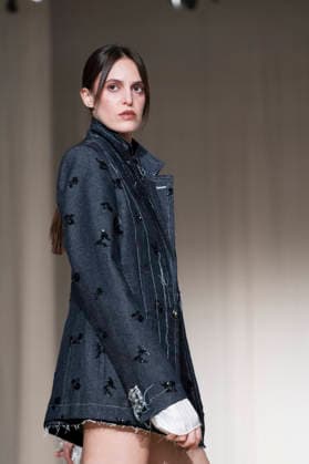 ROMANIAN DESIGNERS - MOMAD Fashion Week de Madrid ,Spain - 24 Jul 2026 A model walks the runway wearing a design by Romanian designers during Momad Fashion Week de Madrid in IFEMA Madrid Spain Copyright: xAtilanoxGarciax xSOPAxImagesx photo03115