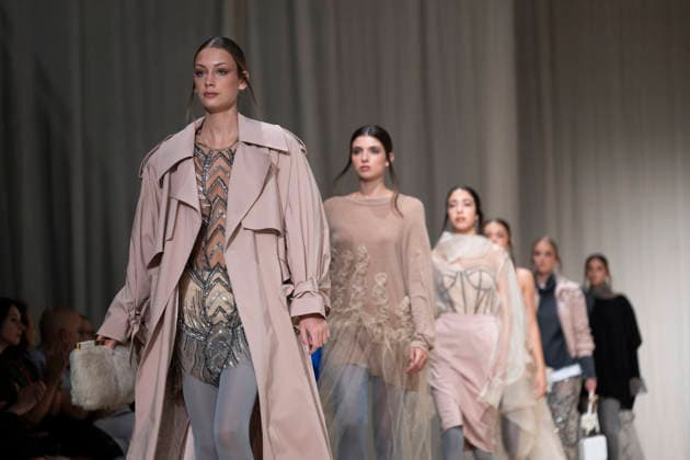 ROMANIAN DESIGNERS - MOMAD Fashion Week de Madrid ,Spain - 24 Jul 2026 A model walks the runway wearing a design by Romanian designers during Momad Fashion Week de Madrid in IFEMA Madrid Spain Copyright: xAtilanoxGarciax xSOPAxImagesx photo03134