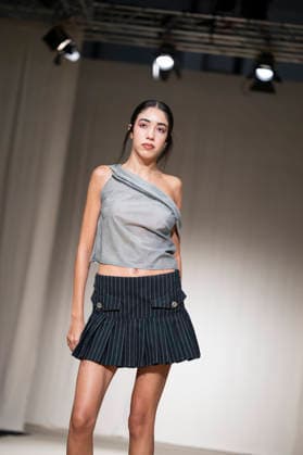 ROMANIAN DESIGNERS - MOMAD Fashion Week de Madrid ,Spain - 24 Jul 2026 A model walks the runway wearing a design by Romanian designers during Momad Fashion Week de Madrid in IFEMA Madrid Spain Copyright: xAtilanoxGarciax xSOPAxImagesx photo03157
