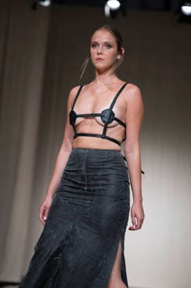 ROMANIAN DESIGNERS - MOMAD Fashion Week de Madrid ,Spain - 24 Jul 2026 A model walks the runway wearing a design by Romanian designers during Momad Fashion Week de Madrid in IFEMA Madrid Spain Copyright: xAtilanoxGarciax xSOPAxImagesx photo03159