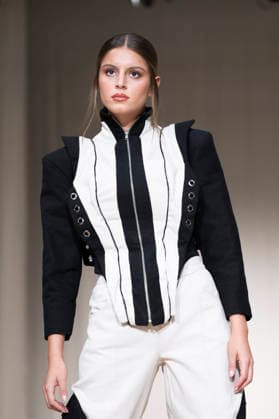 ROMANIAN DESIGNERS - MOMAD Fashion Week de Madrid ,Spain - 24 Jul 2026 A model walks the runway wearing a design by Romanian designers during Momad Fashion Week de Madrid in IFEMA Madrid Spain Copyright: xAtilanoxGarciax xSOPAxImagesx photo03172