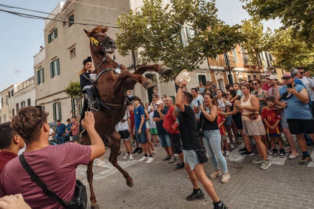 July 24, 2026, Es Castell, Menorca Balearic Islands, Spain: A caixer, or horse rider, rears his horse prior to the traditional Jaleo at the Sant MartoÂ­ Festival in Es Castell. Es Castell Spain - ZUMAo105 20260724_fap_o105_020 Copyright: xMatthiasxOesterlex