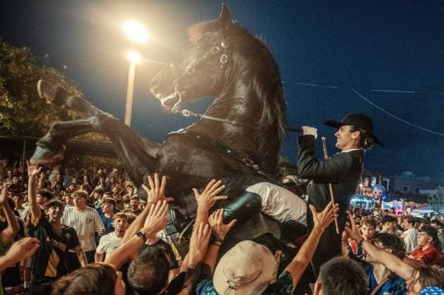July 24, 2026, Es Castell, Menorca Balearic Islands, Spain: A caixer, or horse rider, rears his horse amid a cheering crowd during the traditional Jaleo at the Sant MartoÂ­ Festival in Es Castell. Es Castell Spain - ZUMAo105 20260724_fap_o105_025 Copyright: xMatthiasxOesterlex