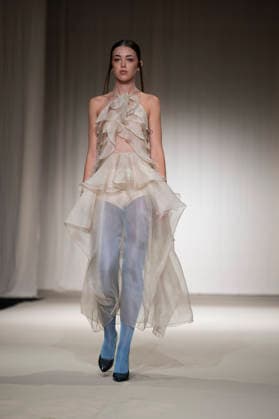 July 24, 2026, Madrid, Spain: A model walks the runway wearing a design by Romanian designers during Momad Fashion Week de Madrid in IFEMA Madrid Spain - ZUMAs197 20260724_aaa_s197_165 Copyright: xAtilanoxGarciax