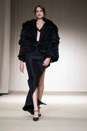July 24, 2026, Madrid, Spain: A model walks the runway wearing a design by Romanian designers during Momad Fashion Week de Madrid in IFEMA Madrid Spain - ZUMAs197 20260724_aaa_s197_178 Copyright: xAtilanoxGarciax