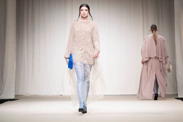 July 24, 2026, Madrid, Spain: A model walks the runway wearing a design by Romanian designers during Momad Fashion Week de Madrid in IFEMA Madrid Spain  - ZUMAs197 20260724_aaa_s197_192 Copyright: xAtilanoxGarciax