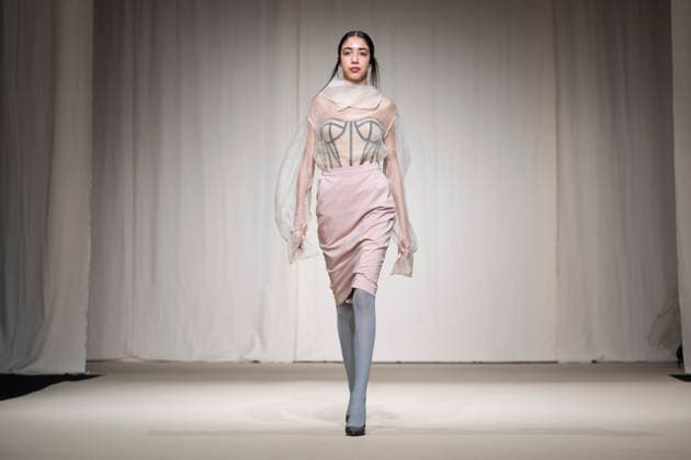 July 24, 2026, Madrid, Spain: A model walks the runway wearing a design by Romanian designers during Momad Fashion Week de Madrid in IFEMA Madrid Spain - ZUMAs197 20260724_aaa_s197_184 Copyright: xAtilanoxGarciax