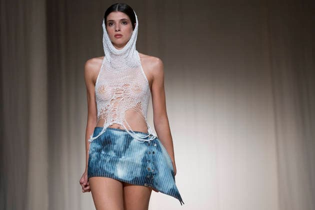 July 24, 2026, Madrid, Spain: A model walks the runway wearing a design by Romanian designers during Momad Fashion Week de Madrid in IFEMA Madrid Spain  - ZUMAs197 20260724_aaa_s197_216 Copyright: xAtilanoxGarciax