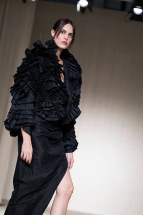 July 24, 2026, Madrid, Spain: A model walks the runway wearing a design by Romanian designers during Momad Fashion Week de Madrid in IFEMA Madrid Spain - ZUMAs197 20260724_aaa_s197_199 Copyright: xAtilanoxGarciax