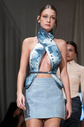 July 24, 2026, Madrid, Spain: A model walks the runway wearing a design by Romanian designers during Momad Fashion Week de Madrid in IFEMA Madrid Spain - ZUMAs197 20260724_aaa_s197_225 Copyright: xAtilanoxGarciax