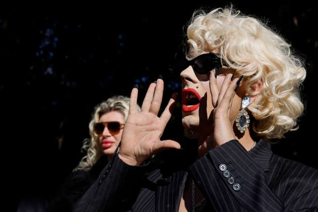 SING-IN PROTEST, A drag queen shouts out during a ˜Sing-In™ protest in solidarity with Divine Playhouse at Hyde Park in Sydney, Saturday, July 25, 2026. The Trans Theatre Group was evicted from its rental property in Kent Street after its landlord Revelop terminated the venue s lease claiming offensive trade - a legal term deriving from an 1842 NSW law implemented to regulate foul smells and industrial waste - and never once in 184 years has a court been asked to consider if it extends to moral offensiveness. ( NO ARCHIVING SYDNEY NEW SOUTH WALES AUSTRALIA  Copyright: xJESSICAxHROMASx 20260725171862681369