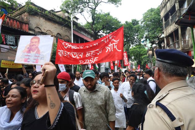 July 24, 2026, Kolkata, West Bengal, India: Activists of the Students Federation of India (SFI) and supporters of Cockroach Janta Party(CJP) participate in a protest march condemning a police baton charge on demonstrators and demanding the resignation of India s Education Minister, Dharmendra Pradhan, over alleged examination irregularities, in Kolkata, India, July 24, 2026. Kolkata India - ZUMAd217 20260724_zip_d217_002 Copyright: xRupakxDexChowdhurix