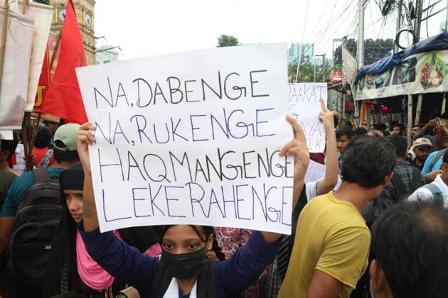 July 24, 2026, Kolkata, West Bengal, India: Activists of the Students Federation of India (SFI) and supporters of Cockroach Janta Party(CJP) participate in a protest march condemning a police baton charge on demonstrators and demanding the resignation of India s Education Minister, Dharmendra Pradhan, over alleged examination irregularities, in Kolkata, India, July 24, 2026. Kolkata India  - ZUMAd217 20260724_zip_d217_023 Copyright: xRupakxDexChowdhurix
