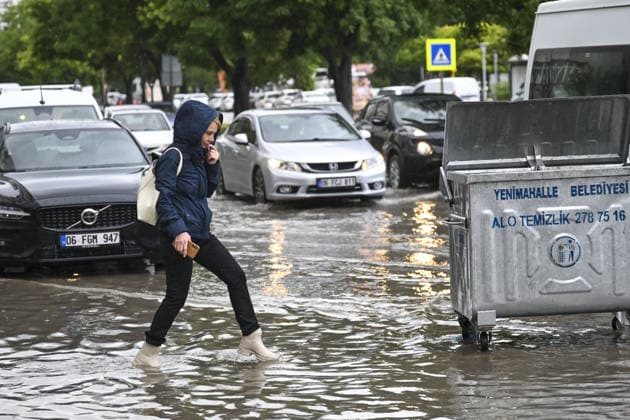 Heavy rainfall causes localized flooding in Turkiye s capital Ankara during summer ANKARA, TURKIYE – JULY 25: A pedestrian walks through a flooded street following heavy rainfall during summer in Ankara, Turkiye, on July 25, 2026. Heavy rain triggered localized flooding on several roads, causing traffic disruptions across the city. Utku Ucrak Anadolu Ankara Turkey. Editorial use only. Please get in touch for any other usage.  Copyright: x2026xAnadoluxUtkuxUcrakx