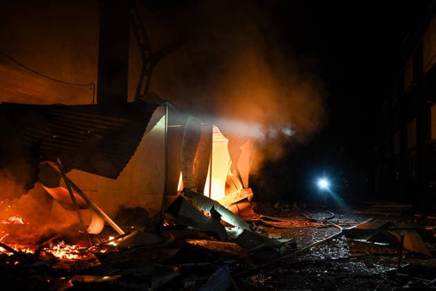 A shopping complex burns following a Russian attack in Zaporizhzhia, Ukraine, July 25, 2026. In the early hours of Saturday, July 25, Russian troops struck the southeastern Ukrainian city with drones, igniting a fire that spread through shops and trading pavilions over an area of about 900 square metres. A 63-year-old man was injured in the drone strike. (Photo by Dmytro Smolienko Ukrinform) Russian army attacks Zaporizhzhia with drones  Copyright: xDmytroxSmolienkox