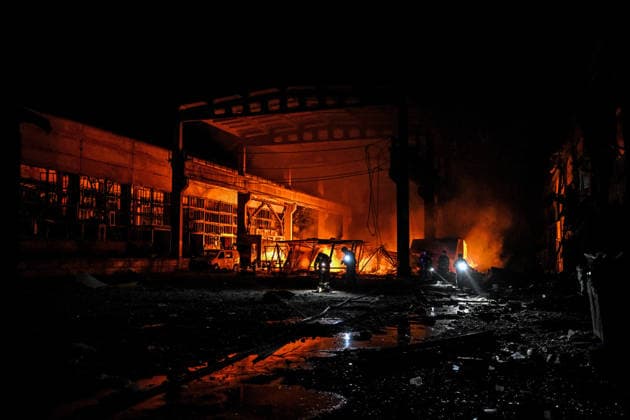 Rescuers extinguish a fire at a shopping complex caused by a Russian attack in Zaporizhzhia, Ukraine, July 25, 2026. In the early hours of Saturday, July 25, Russian troops struck the southeastern Ukrainian city with drones, igniting a fire that spread through shops and trading pavilions over an area of about 900 square metres. A 63-year-old man was injured in the drone strike. (Photo by Dmytro Smolienko Ukrinform) Russian army attacks Zaporizhzhia with drones  Copyright: xDmytroxSmolienkox