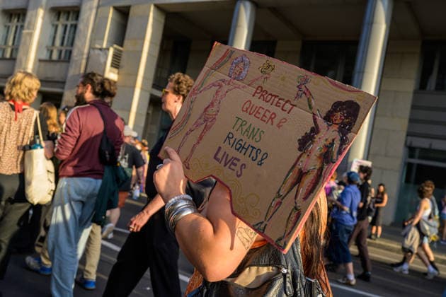 July 24, 2026, Berlin, Berlin, Germany: A person marches along with their placard in favor of Queer person s rights at Dyke* March 2026, on July 24 2026, in Berlin, Germany. Thousands of demonstrators marched in the streets of Berlin s City Center and Kreuzberg districts for the annual Dyke* March just a day before the annual CSD parade and Internationalist Queer Pride Berlin Germany  - ZUMAk201 20260724_zip_k201_006 Copyright: xNikosxKanistrasx