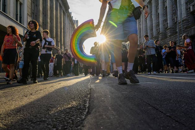 July 24, 2026, Berlin, Berlin, Germany: A person holds a rainbow ballon at Dyke* March 2026, on July 24 2026, in Berlin, Germany. Thousands of demonstrators marched in the streets of Berlin s City Center and Kreuzberg districts for the annual Dyke* March just a day before the annual CSD parade and Internationalist Queer Pride Berlin Germany  - ZUMAk201 20260724_zip_k201_009 Copyright: xNikosxKanistrasx