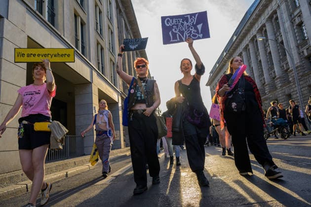July 24, 2026, Berlin, Berlin, Germany: People show their placards in favor of Queer people, at Dyke* March 2026, on July 24 2026, in Berlin, Germany. Thousands of demonstrators marched in the streets of Berlin s City Center and Kreuzberg districts for the annual Dyke* March just a day before the annual CSD parade and Internationalist Queer Pride Berlin Germany - ZUMAk201 20260724_zip_k201_008 Copyright: xNikosxKanistrasx