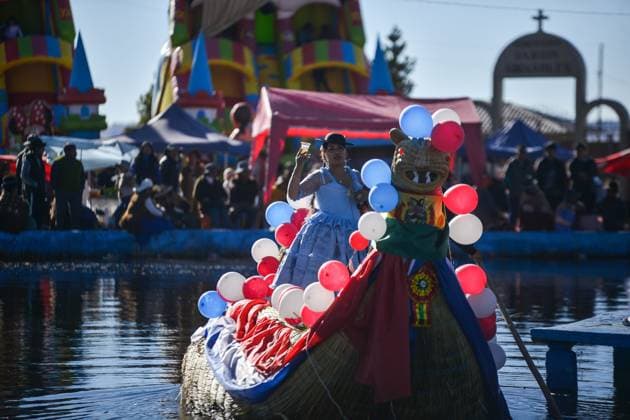 July 24, 2026, Guaqui, La Paz, Bolivia: GUAQUI, BOLIVIA Ã¢â‚¬ JULY 24, 2026: Devotees take part in the traditional Balseada Festival honoring Saint James the Apostle (Santiago ApoÂ³stol) on Lake Titicaca in Guaqui, Bolivia. The annual celebration features a ceremonial procession of decorated boats attended by residents, pilgrims and local authorities. Guaqui, La Paz Bolivia - ZUMAq101 20260724_zna_q101_228 Copyright: xCarlosxSoÂ¡NchezxNavasx