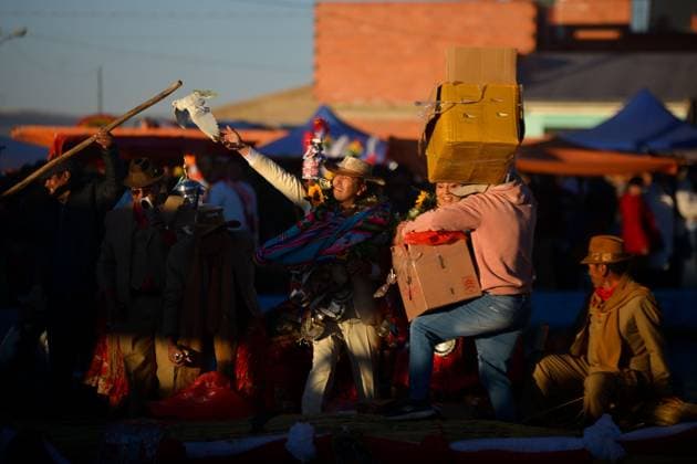 July 24, 2026, Guaqui, La Paz, Bolivia: GUAQUI, BOLIVIA Ã¢â‚¬ JULY 24, 2026: Devotees take part in the traditional Balseada Festival honoring Saint James the Apostle (Santiago ApoÂ³stol) on Lake Titicaca in Guaqui, Bolivia. The annual celebration features a ceremonial procession of decorated boats attended by residents, pilgrims and local authorities. Guaqui, La Paz Bolivia - ZUMAq101 20260724_zna_q101_229 Copyright: xCarlosxSoÂ¡NchezxNavasx