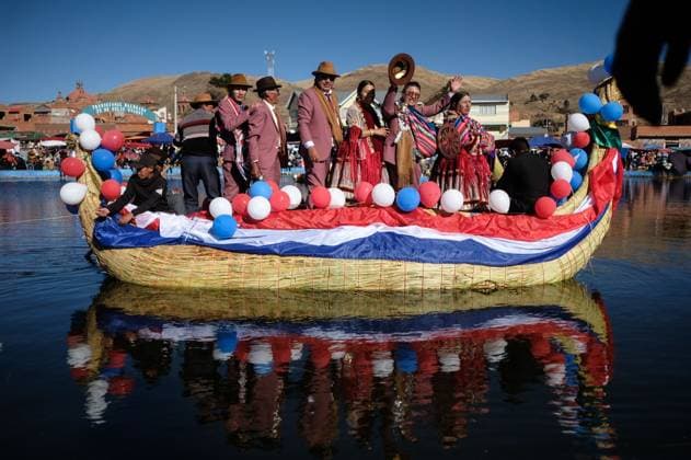 July 24, 2026, Guaqui, La Paz, Bolivia: GUAQUI, BOLIVIA Ã¢â‚¬ JULY 24, 2026: Devotees take part in the traditional Balseada Festival honoring Saint James the Apostle (Santiago ApoÂ³stol) on Lake Titicaca in Guaqui, Bolivia. The annual celebration features a ceremonial procession of decorated boats attended by residents, pilgrims and local authorities. Guaqui, La Paz Bolivia - ZUMAq101 20260724_zna_q101_235 Copyright: xCarlosxSoÂ¡NchezxNavasx