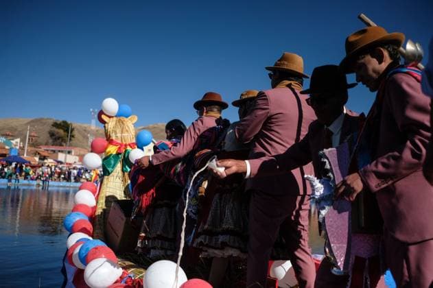July 24, 2026, Guaqui, La Paz, Bolivia: GUAQUI, BOLIVIA Ã¢â‚¬ JULY 24, 2026: Devotees take part in the traditional Balseada Festival honoring Saint James the Apostle (Santiago ApoÂ³stol) on Lake Titicaca in Guaqui, Bolivia. The annual celebration features a ceremonial procession of decorated boats attended by residents, pilgrims and local authorities. Guaqui, La Paz Bolivia  - ZUMAq101 20260724_zna_q101_236 Copyright: xCarlosxSoÂ¡NchezxNavasx