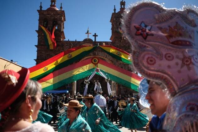 July 24, 2026, Guaqui, La Paz, Bolivia: GUAQUI, BOLIVIA Ã¢â‚¬ JULY 24, 2026: Devotees take part in the traditional Balseada Festival honoring Saint James the Apostle (Santiago ApoÂ³stol) on Lake Titicaca in Guaqui, Bolivia. The annual celebration features a ceremonial procession of decorated boats attended by residents, pilgrims and local authorities. Guaqui, La Paz Bolivia - ZUMAq101 20260724_zna_q101_242 Copyright: xCarlosxSoÂ¡NchezxNavasx