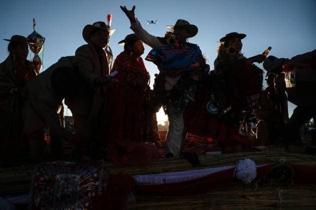 July 24, 2026, Guaqui, La Paz, Bolivia: GUAQUI, BOLIVIA Ã¢â‚¬ JULY 24, 2026: Devotees take part in the traditional Balseada Festival honoring Saint James the Apostle (Santiago ApoÂ³stol) on Lake Titicaca in Guaqui, Bolivia. The annual celebration features a ceremonial procession of decorated boats attended by residents, pilgrims and local authorities. Guaqui, La Paz Bolivia - ZUMAq101 20260724_zna_q101_245 Copyright: xCarlosxSoÂ¡NchezxNavasx