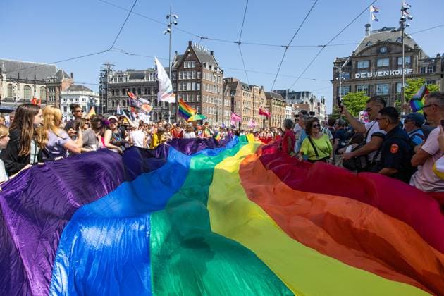 AMSTERDAM - Participants in the 13th edition of the Pride Walk are walking through the center of Amsterdam. With the walk, they are calling attention to equal rights for LGBTQ+ people worldwide. DINGENA MOL ANP netherlands out - belgium out  Copyright: xx x564254022x originalFilename: 564254022.jpg