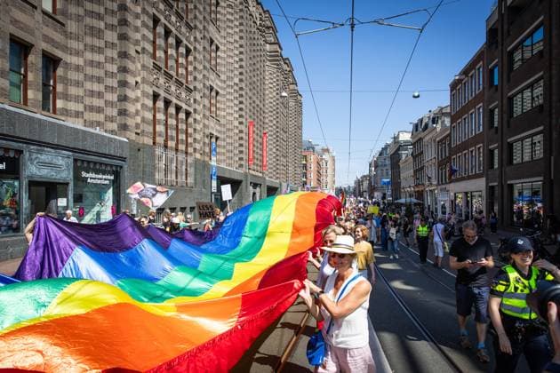 AMSTERDAM - Participants in the 13th edition of the Pride Walk are walking through the center of Amsterdam. With the walk, they are calling attention to equal rights for LGBTQ+ people worldwide. DINGENA MOL ANP netherlands out - belgium out  Copyright: xx x564254287x originalFilename: 564254287.jpg