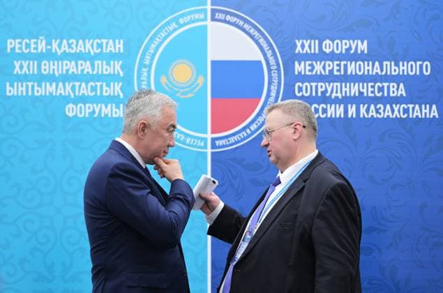 Russia Putin Siberian Federal District 9211613 25.07.2026 Kazakh Deputy Prime Minister and Minister of National Economy Serik Zhumangarin and Russian Deputy Prime Minister Alexei Overchuk wait before a meeting between Russian President Vladimir Putin and Kazakh President Kassym-Jomart Tokayev on the sidelines of the 22nd Russia-Kazakhstan Interregional Cooperation Forum in Omsk, Russia. Alexey Nikolskiy Sputnik Omsk Russia  Copyright: xAlexeyxNikolskiyx