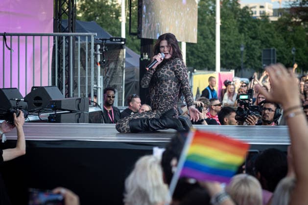 July 24, 2026, Berlin, Germany: Berlin-based rapper Ikkimel performs on stage in front of an LGBT flag during the Democracy Evening? rally at the Brandenburg Gate on the opening day of Christopher Street Day (CSD). Christopher Street Day (CSD) is Berlin™s annual Pride demonstration for the rights and visibility of lesbian, gay, bisexual, transgender, intersex and other queer people. Its name refers to Christopher Street in New York City, where resistance to a police raid at the Stonewall Inn in June 1969 sparked several days of protests and became a landmark in the modern LGBTQ+ rights movement..Berlin held its first Christopher Street Day in West Berlin on June 30, 1979. Around 450 people joined the demonstration under the slogan  - ZUMAs197 20260724_aaa_s197_348 Copyright: xVasilyxKrestyaninovx