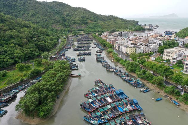 (260725) -- BEIJING, July 25, 2026 -- A drone photo taken on July 25, 2026 shows fishing boats taking shelter from the typhoon at a port in Shenzhen-Shanwei Special Cooperation Zone in south China s Guangdong Province. China s State Flood Control and Drought Relief Headquarters on Saturday raised its emergency response for flood and typhoon control in Guangdong Province to Level III as Typhoon Noul intensified, while activating a Level IV flood emergency response for Jiangxi and Hunan provinces. Typhoon Noul, the 12th typhoon of the year, is expected to make landfall along the coast between Hong Kong and Huilai in Guangdong Province between Saturday evening and Sunday morning. ) CHINA-TYPHOON NOUL-FISHING BOAT-SHELTERING (CN) LuxHanxin 