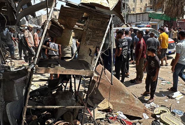 Palestinians gather after Israeli strike near al-Aqsa Martyrs Hospital Palestinians gather at the site of an Israeli airstrike near the entrance of al-Aqsa Martyrs Hospital in Deir al-Balah, central Gaza Strip, as ambulance crews evacuate wounded people from the scene, on July 25, 2026. Medical sources said that some of the injured were in critical condition. Photo by Ahmed Ibrahim apaimages Deir al-Balah Gaza Palestinian Territory 250726_Deir_al-Balah_AI_00(20) Copyright: xapaimagesxAhmedxIbrahimx xapaimagesx