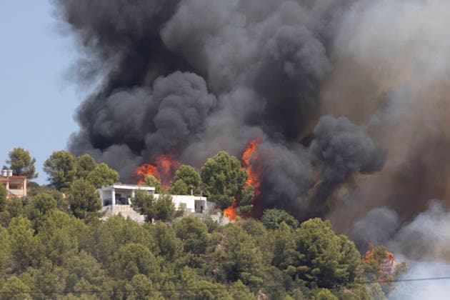 The UME Has Been Activated Due to a Wildfire with Multiple Hotspots in La Vall d Uixó Flames are approaching a house due to a wildfire, on July 25, 2026, in Vall d’Uixó, Castellón, Valencian Community, Spain. Firefighters from Castellón have been working since Saturday morning to contain a wildfire that broke out in the municipality of La Vall d’Uixó, which is currently spreading rapidly, prompting a request for assistance from the Military Emergency Unit (UME), and Civil Protection has ordered the evacuation of the town of La Vilavella. JULY 25, 2026 FOREST FIRE Carme Ripollé Vall d’Uixó, Castellón, Valencian Community Vall d’Uixó, Castellón, Community of Spain  Copyright: xCarmexRipollÃ sx 7687367