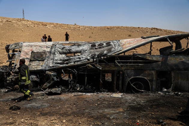 35 killed, 30 injured in central Syria bus collision DAMASCUS, SYRIA - JULY 25: Teams conduct an investigation and continue their work at the scene of the accident where two passenger buses collided on the Deir ez-Zor–Damascus highway in central Syria on July 25, 2026. At least 35 people were killed and 30 others injured Saturday when two passenger buses collided on the Deir ez-Zor–Damascus highway in central Syria, according to the Health Ministry. Abdulkerim el-Selim Anadolu Damascus Syria. Editorial use only. Please get in touch for any other usage.  Copyright: x2026xAnadoluxAbdulkerimxel-Selimx
