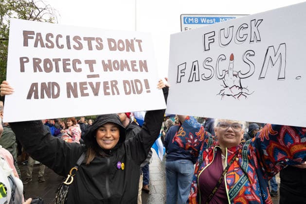 July 25, 2026, Glasgow, Scotland, UK: Pro-immigration protesters aligned with Stand Up To Racism Scotland and other allied organisations hold placards and banners during a demonstration in Glasgow. The protest took place amid heightened tensions over immigration and asylum seekers following months of unrest and protests across Scotland and was met with a counter protest held by anti-immigration supporters. Glasgow UK - ZUMAs357 20260725_zip_s357_002 Copyright: xCameronxScottx