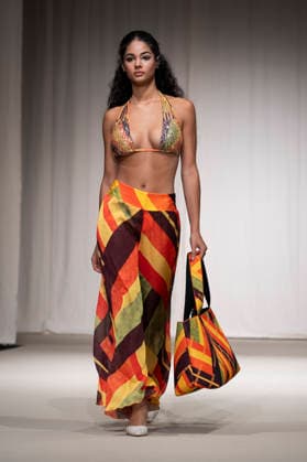 July 25, 2026, Madrid, Spain: A model walks the runway wearing a design by AQUADICOCCO during Momad Fashion Week de Madrid in IFEMA. Madrid Spain  - ZUMAs197 20260725_aaa_s197_009 Copyright: xAtilanoxGarciax