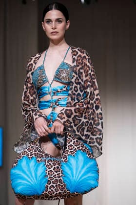 July 25, 2026, Madrid, Spain: A model walks the runway wearing a design by AQUADICOCCO during Momad Fashion Week de Madrid in IFEMA. Madrid Spain  - ZUMAs197 20260725_aaa_s197_014 Copyright: xAtilanoxGarciax