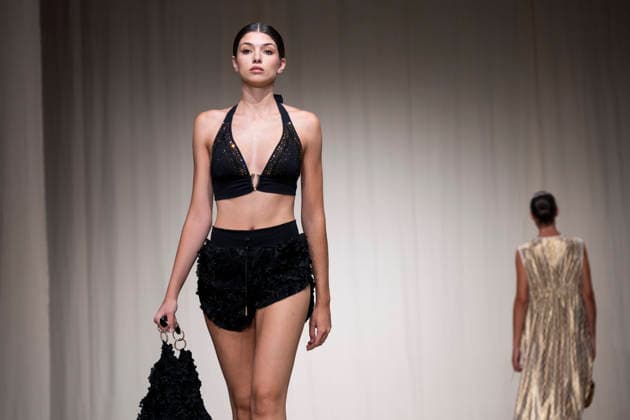 AQUADICOCCO - MOMAD Fashion Week de Madrid, Spain - 25 Jul 2026 A model walks the runway wearing a design by AQUADICOCCO during Momad Fashion Week de Madrid in IFEMA. Madrid Spain Copyright: xAtilanoxGarciax xSOPAxImagesx photo03395