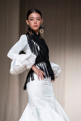 July 25, 2026, Madrid, Spain: A model walks the runway wearing a design by Flamentex during the Momad Fashion Week de Madrid in IFEMA. Madrid Spain  - ZUMAs197 20260725_aaa_s197_075 Copyright: xAtilanoxGarciax