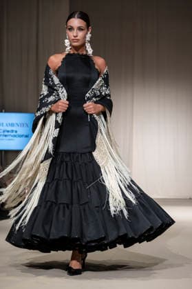 July 25, 2026, Madrid, Spain: A model walks the runway wearing a design by Flamentex during the Momad Fashion Week de Madrid in IFEMA. Madrid Spain  - ZUMAs197 20260725_aaa_s197_077 Copyright: xAtilanoxGarciax